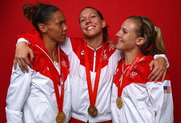 BEIJING - AUGUST 22:  (L-R) Natasha Kai, Lauren Cheney and Amy Rodriguez of the United States pose in the NBC Today Show Studio as part of the Gold Medal winning Women's Football Team at the Beijing 2008 Olympic Games on August 22, 2008 in Beijing, China.  (Photo by Ryan Pierse/Getty Images)