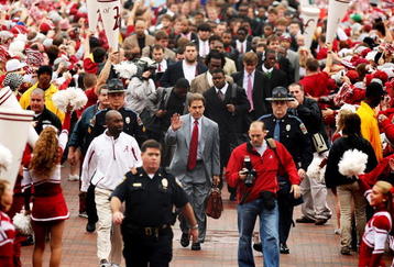 TUSCALOOSA, FL - NOVEMBER 29:  Head coach Nick Saban of the Alabama Crimson Tide waves to fans during the walk of champions before taking on the Auburn Tigers at Bryant-Denny Stadium on November 29, 2008 in Tuscaloosa, Alabama.  (Photo by Doug Benc/Getty Images)