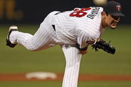 MINNEAPOLIS - OCTOBER 11: Carl Pavano #48 of the Minnesota Twins delivers the ball against the New York Yankees in Game Three of the ALDS during the 2009 MLB Playoffs at the Hubert H. Humphrey Metrodome on October 11, 2009 in Minneapolis, Minnesota. (Photo by Jonathan Daniel/Getty Images)