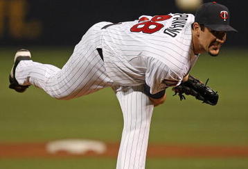 MINNEAPOLIS - OCTOBER 11: Carl Pavano #48 of the Minnesota Twins delivers the ball against the New York Yankees in Game Three of the ALDS during the 2009 MLB Playoffs at the Hubert H. Humphrey Metrodome on October 11, 2009 in Minneapolis, Minnesota. (Photo by Jonathan Daniel/Getty Images)