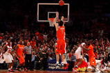 NEW YORK - MARCH 14: Andy Rautins #1 of the Syracuse Orange shoots a three against the Louisville Cardinals during the championship game of the Big East Tournament at Madison Square Garden on March 14, 2009 in New York City.  (Photo by Jim McIsaac/Getty Images)