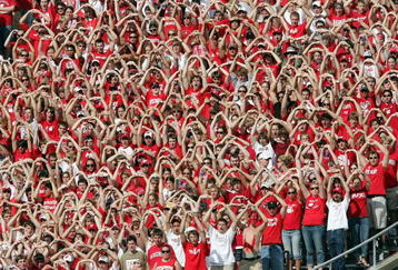 MADISON, WI - SEPTEMBER 16:  The Wisconsin Badgers student section helps their team during the opening kickoff against the San Diego State Aztecs on September 16, 2006 at Camp Randall Stadium in Madison, Wisconsin.  (Photo by Elsa/Getty Images)