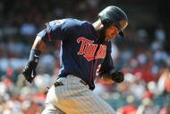 ANAHEIM, CA - JULY 26: Denard Span #2 of the Minnesota Twins runs the bases after hitting a home run in the eighth inning against the Los Angeles Angels of Anaheim at Angels Stadium on July 26, 2009 in Anaheim, California. (Photo by Harry How/Getty Images)
