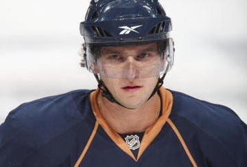 EDMONTON, CANADA - SEPTEMBER 16:  Denis Grebeshkov #37 of the Edmonton Oilers looks on against the New York Islanders on September 16, 2009 at Rexall Place in Edmonton, Alberta, Canada. The Oilers won 3-2. (Photo by Dale MacMillan/Getty Images)