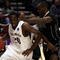PORTLAND, OR - MARCH 21:  Quincy Pondexter #20 of the Washington Huskies drives on Keaton Grant #5 of the Purdue Boilermakers in the first half during the second round of the NCAA Division I Men's Basketball Tournament at the Rose Garden on March 21, 2009 in Portland, Oregon.  (Photo by Jonathan Ferrey/Getty Images)