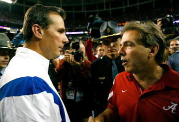 ATLANTA - DECEMBER 06:  Head coach Nick Saban of the Alabama Crimson Tide congratulates head coach Urban Meyer of the Florida Gators after the Gators 31-20 win in the SEC Championship on December 6, 2008 at the Georgia Dome in Atlanta, Georgia.  (Photo by Kevin C. Cox/Getty Images)