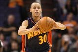 PHOENIX - OCTOBER 30:  Stephen Curry #30 of the Golden State Warriors passes the ball during the NBA game against the Phoenix Suns at US Airways Center on October 30, 2009 in Phoenix, Arizona. The Suns defeated the Warriors 123-101.  NOTE TO USER: User expressly acknowledges and agrees that, by downloading and or using this photograph, User is consenting to the terms and conditions of the Getty Images License Agreement.  (Photo by Christian Petersen/Getty Images)