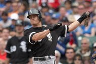 CHICAGO - JUNE 17: Gordon Beckham #15 of the Chicago White Sox swings against the Chicago Cubs on June 17, 2009 at Wrigley Field in Chicago, Illinois. (Photo by Jonathan Daniel/Getty Images)