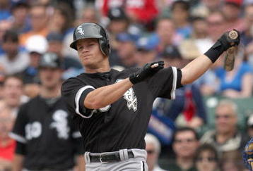 CHICAGO - JUNE 17: Gordon Beckham #15 of the Chicago White Sox swings against the Chicago Cubs on June 17, 2009 at Wrigley Field in Chicago, Illinois. (Photo by Jonathan Daniel/Getty Images)