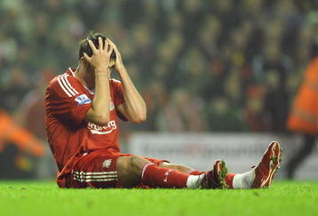 LIVERPOOL, ENGLAND - NOVEMBER 09:  Albert Riera of Liverpool reacts after sustaining an injury during the Barclays Premier League match between Liverpool and Birmingham City at Anfield on November 9, 2009 in Liverpool, England. (Photo by Laurence Griffiths/Getty Images)