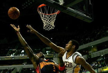 INDIANAPOLIS - JANUARY 16:  Al Harrington #3 of the Golden State Warriors puts up a shot against Danny Granger #33 of the Indiana Pacers January 16, 2008 at Conseco Fieldhouse in Indianapolis, Indiana.  (Photo by Matthew Stockman/Getty Images)