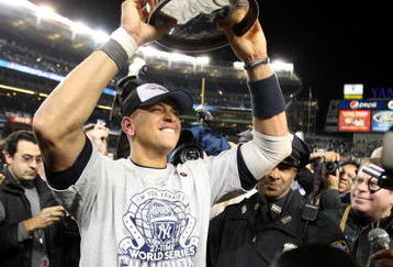 NEW YORK - NOVEMBER 04:  Alex Rodriguez #13 of the New York Yankees celebrates with the trophy after their 7-3 win  against the Philadelphia Phillies in Game Six of the 2009 MLB World Series at Yankee Stadium on November 4, 2009 in the Bronx borough of New York City.  (Photo by Jed Jacobsohn/Getty Images)