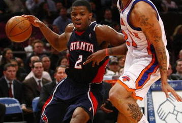 NEW YORK - MARCH 04:  Joe Johnson #2 of the Atlanta Hawks goes up against Wilson Chandler #21 of the New York Knicks at Madison Square Garden March 4, 2009 in New York City. NOTE TO USER: User expressly acknowledges and agrees that, by downloading and/or using this Photograph, User is consenting to the terms and conditions of the Getty Images License Agreement.  (Photo by Chris McGrath/Getty Images)
