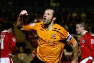 BARNSLEY, UNITED KINGDOM - APRIL 15:  Ian Ashbee of Hull City celebrates scoring the second goal  during the Coca-Cola Championship match between Barnsley and Hull City at Oakwell on April 15, 2008 in Barnsley, England.  (Photo by Clive Brunskill/Getty Images)