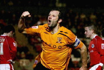 BARNSLEY, UNITED KINGDOM - APRIL 15:  Ian Ashbee of Hull City celebrates scoring the second goal  during the Coca-Cola Championship match between Barnsley and Hull City at Oakwell on April 15, 2008 in Barnsley, England.  (Photo by Clive Brunskill/Getty Images)