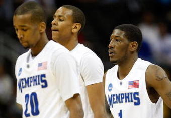 KANSAS CITY, MO - MARCH 19:  Willie Kemp #1 of the Memphis Tigers walks to the bench with his teammates during their first round game against the CSUN Matadors in the NCAA Division I Men's Basketball Tournament at the Sprint Center on March 19, 2009 in Kansas City, Missouri.  The Tigers defeated the Matadors 81-70.  (Photo by Jamie Squire/Getty Images)