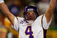 GREEN BAY, WI - NOVEMBER 01: Quarterback Brett Favre #4 of the Minnesota Vikings celebrates a touchdown by teammate Percy Harvin #12 after a 51 yard touchdown pass during the third quarter of the game against the Green Bay Packers at Lambeau Field on November 1, 2009 in Green Bay, Wisconsin. (Photo by Scott Boehm/Getty Images)