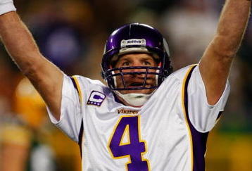 GREEN BAY, WI - NOVEMBER 01: Quarterback Brett Favre #4 of the Minnesota Vikings celebrates a touchdown by teammate Percy Harvin #12 after a 51 yard touchdown pass during the third quarter of the game against the Green Bay Packers at Lambeau Field on November 1, 2009 in Green Bay, Wisconsin. (Photo by Scott Boehm/Getty Images)