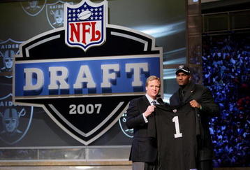 NEW YORK - APRIL 28:  JaMarcus Russell poses with NFL Commissioner Roger Goodell after being chosen first overall by the Oakland Raiders at the 2007 NFL Draft at Radio City Music Hall April 28, 2007 in New York City.  (Photo by Nick Laham/Getty Images)