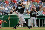 WASHINGTON - AUGUST 06:  First baseman Nick Johnson #20 of the Florida Marlins takes an at bat against the Washington Nationals at Nationals Park on August 6, 2009 in Washington, DC. The Nationals defeated the Marlins 12-8.  (Photo by Doug Pensinger/Getty Images)