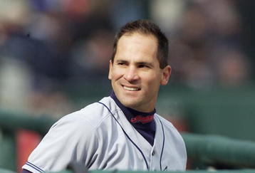 05 APRIL 2002: Omar Vizquel #13, of the Cleveland Indians smiles from the dugout late in the game at the Detroit Tigers home opener at Comerica Park in Detroit,  MI. Cleveland won the game 10-1. DIGITALIMAGE. Mandatory Credit: Tom Pidgeon/Getty Images
