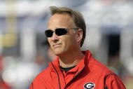 ORLANDO, FL - JANUARY 1: Coach Mark Richt of the University of Georgia directs play against the Michigan State Spartans at the 2009 Capital One Bowl at the Citrus Bowl on January 1, 2009 in Orlando, Florida.  (Photo by Al Messerschmidt/Getty Images) 
