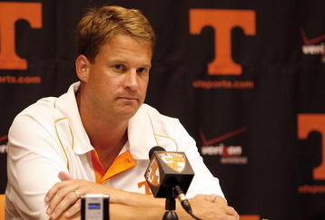 KNOXVILLE, TN - SEPTEMBER 12: Lane Kiffin, head coach of the Tennessee Volunteers talks in the press conference after a game against the UCLA Bruins on September 12, 2009 at Neyland Stadium in Knoxville, Tennessee. UCLA beat Tennessee 19-15. (Photo by Joe Murphy/Getty Images)