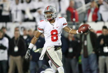 STATE COLLEGE, PA - NOVEMBER 7: Wide receiver DeVier Posey #8 of the Ohio State Buckeyes scores a touchdown during a game against the Penn State Nittany Lions on November 7, 2009 at Beaver Stadium in State College, Pennsylvania. Ohio State won 24-7. (Photo by Hunter Martin/Getty Images)