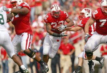 MADISON, WI - SEPTEMBER 26: John Clay #32 of the Wisconsin Badgers carries the ball during the game against  the Michigan State Spartans on September 26, 2009 at Camp Randall Stadium in Madison, Wisconsin. Wisconsin defeated Michigan State 38-30. (Photo by Jonathan Daniel/Getty Images)