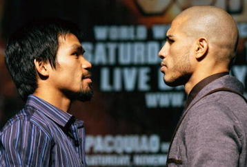 LAS VEGAS - NOVEMBER 11:  Boxer Manny Pacquiao (L) and WBO welterweight champion Miguel Cotto pose during the final news conference for their bout at the MGM Grand Hotel/Casino November 11, 2009 in Las Vegas, Nevada. Pacquiao and Cotto will meet in a WBO welterweight title fight at the MGM Grand on November 14.  (Photo by Ethan Miller/Getty Images)