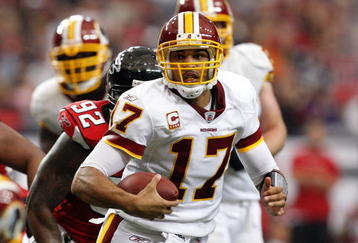 ATLANTA - NOVEMBER 08:  Quarterback Jason Campbell #17 of the Washington Redskins rushes upfield against the Atlanta Falcons at Georgia Dome on November 8, 2009 in Atlanta, Georgia.  (Photo by Kevin C. Cox/Getty Images)