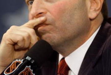 3 Feb 2001:  Commissioner Gary Bettman ponders a  question from the media during a press conference before the NHL All-Star Game at the Pepsi Center in Denver, Colorado.   DIGITAL IMAGE. Mandatory Credit: Brian Bahr/ALLSPORT