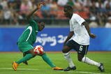 BEIJING - AUGUST 13:  Maurice Edu #6 of the United States goes after the ball in front of Chinedu Ogbuke Obasi #7 of Nigeria during the Men's First Round Group B match at the Workers' Stadium on Day 5 of the Beijing 2008 Olympic Games on August 13, 2008 in Beijing, China.  (Photo by Shaun Botterill/Getty Images)