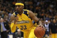 MILWAUKEE - FEBRUARY 25: Lazar Hayward #32 of the Marquette Golden Eagles drives upcourt against the Connecticut Huskies on February 25, 2009 at the Bradley Center in Milwaukee, Wisconsin. Connecticut defeated Marquette 93-82. (Photo by Jonathan Daniel/Getty Images)