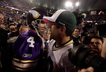 MINNEAPOLIS - OCTOBER 05:  Quarterback Brett Favre #4 of the Minnesota Vikings hugs Aaron Rodgers #12 of the Green Bay Packers following the Vikings victory over the Packers on October 5, 2009 at Hubert H. Humphrey Metrodome in Minneapolis, Minnesota.  (Photo by Jamie Squire/Getty Images)