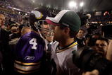 MINNEAPOLIS - OCTOBER 05:  Quarterback Brett Favre #4 of the Minnesota Vikings hugs Aaron Rodgers #12 of the Green Bay Packers following the Vikings victory over the Packers on October 5, 2009 at Hubert H. Humphrey Metrodome in Minneapolis, Minnesota.  (Photo by Jamie Squire/Getty Images)