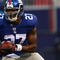 EAST RUTHERFORD, NJ - NOVEMBER 08: Brandon Jacobs #27 of the New York Giantsmakes a break against the San Diego Chargers on November 8, 2009 at Giants Stadium in East Rutherford, New Jersey.  (Photo by Chris McGrath/Getty Images)