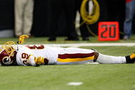 ATLANTA - NOVEMBER 08:  Santana Moss #89 of the Washington Redskins lies on the field after having a pass broken up by the Atlanta Falcons at Georgia Dome on November 8, 2009 in Atlanta, Georgia.  (Photo by Kevin C. Cox/Getty Images)