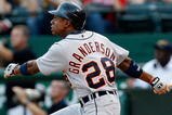 ARLINGTON, TX - JULY 29:  Center fielder Curtis Granderson #28 of the Detroit Tigers hits his second home run of the game in the second inning against the Texas Rangers on July 29, 2009 at Rangers Ballpark in Arlington, Texas.  (Photo by Ronald Martinez/Getty Images)