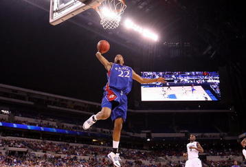 INDIANAPOLIS - MARCH 27:  Marcus Morris #22 of the Kansas Jayhawks drives for a dunk attempt against the Michigan State Spartans during the third round of the NCAA Division I Men's Basketball Tournament at the Lucas Oil Stadium on March 27, 2009 in Indianapolis, Indiana.  (Photo by Andy Lyons/Getty Images)