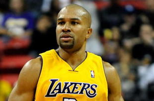 LAS VEGAS - OCTOBER 15:  Derek Fisher #2 of the Los Angeles Lakers brings the ball up the court against the Sacramento Kings during their preseason game at the Thomas & Mack Center October 15, 2009 in Las Vegas, Nevada. NOTE TO USER: User expressly acknowledges and agrees that, by downloading and/or using this Photograph, user is consenting to the terms and conditions of the Getty Images License Agreement.  (Photo by Ethan Miller/Getty Images)