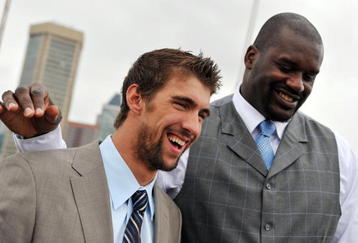 BALTIMORE, MD - AUGUST 22: Olympic swimmer Michael Phelps and basketball star Shaquille O'Neil pose for pictures after a press conference for O'Neil's new reality TV series 'Shaq Vs' at the Rusty Scupper Restuarant on Saturday, August 22, 2009 in Baltimore, Maryland. O'Neil is challenging Olympic gold medalist Michael Phelps to a swimming competition. (Photo by Jay Westcott/Getty Images)