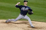 NEW YORK - SEPTEMBER 23:  Tim Hudson #15 of the Atlanta Braves pitches against the New York Mets during the game on September 23, 2009 at Citi Field in the Flushing neighborhood of the Queens borough of New York City.  (Photo by Jared Wickerham/Getty Images)