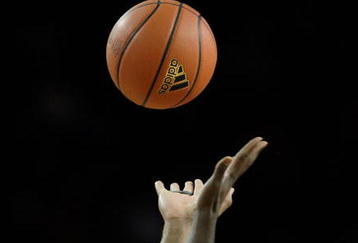 LOUISVILLE, KY - NOVEMBER 04:  The opening jump ball of the Lousville Cardinals game against the Bellarmine Knights at Freedom Hall on November 4, 2009 in Louisville, Kentucky.  (Photo by Andy Lyons/Getty Images)