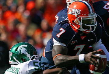 CHAMPAIGN, IL - OCTOBER 10: Juice Williams #7 of the Illinois Fighting Illini is sacked by Trevor Anderson #58 of the Michigan State Spartans on October 10, 2009 at Memorial Stadium at the University of Illinois in Champaign, Illinois. Michigan State defeated Illinois 24-14.  (Photo by Jonathan Daniel/Getty Images)
