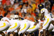 AUBURN, AL - SEPTEMBER 19:  Quarterback Jarrett Brown #16 of the West Virginia Mountaineers against the Auburn Tigers at Jordan-Hare Stadium on September 19, 2009 in Auburn, Alabama.  (Photo by Kevin C. Cox/Getty Images)
