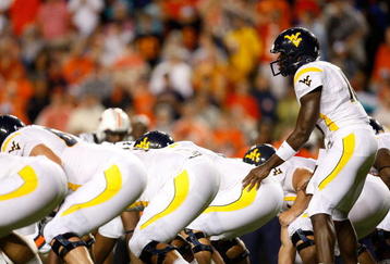 AUBURN, AL - SEPTEMBER 19:  Quarterback Jarrett Brown #16 of the West Virginia Mountaineers against the Auburn Tigers at Jordan-Hare Stadium on September 19, 2009 in Auburn, Alabama.  (Photo by Kevin C. Cox/Getty Images)