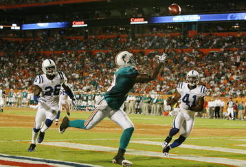 MIAMI - SEPTEMBER 21:  Defensive backs Kelvin Hayden #26 and Antoine Bethea #41 of the Indianapolis Colts watch as Ted Ginn Jr. #19 of the Miami Dolphins nearly hauls in a touchdown catch at Land Shark Stadium on September 21, 2009 in Miami, Florida.  (Photo by Doug Benc/Getty Images)