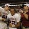 HOUSTON - DECEMBER 7:  (Left to Right) Tight end Trent Smith #88, running back Quentin Griffin #22, and head coach Bob Stoops of the University of Oklahoma Sooners celebrate after winning the Big 12 Conference Championship against the University of Colorado Buffaloes at Reliant Stadium on December 7, 2002 in Houston, Texas.  The Sooners won 29-7.  (Photo by Brian Bahr/Getty Images)
