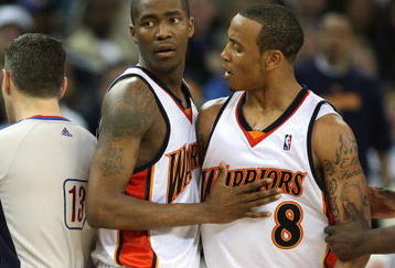 OAKLAND, CA - MARCH 30:  Monta Ellis #8 of the Golden State Warriors is restrained by teammate Jamal Crawford #6 after being called for a technical foul by referee Monty McCutchen against the Memphis Grizzlies during an NBA game on March 30, 2009 at Oracle Arena in Oakland, California. NOTE TO USER: User expressly acknowledges and agrees that, by downloading and or using this photograph, User is consenting to the terms and conditions of the Getty Images License Agreement.  (Photo by Jed Jacobsohn/Getty Images)